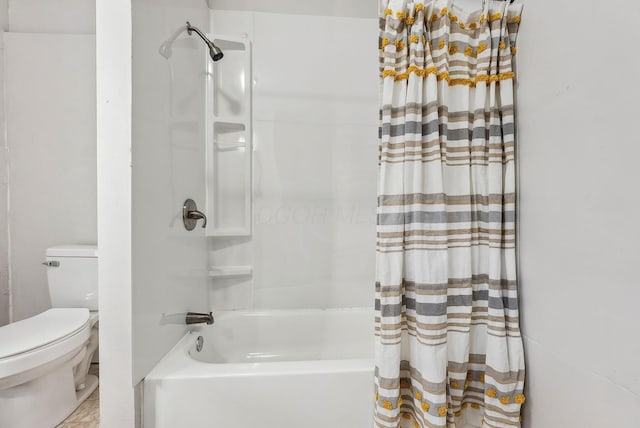 bathroom featuring shower / tub combo with curtain, tile patterned flooring, and toilet