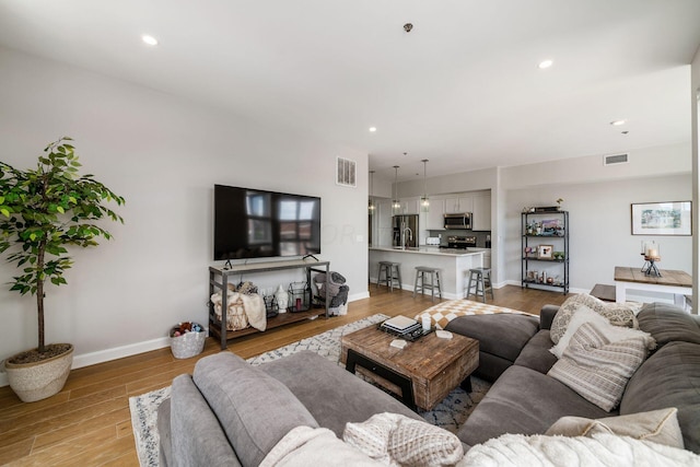 living room featuring light hardwood / wood-style floors