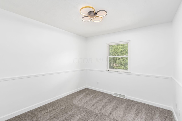 empty room featuring carpet