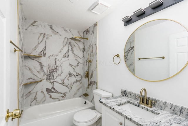 full bathroom with vanity, toilet, and tiled shower / bath