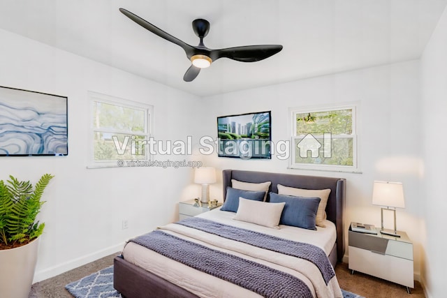 carpeted bedroom with ceiling fan