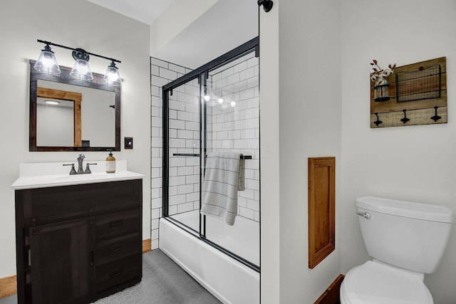 full bathroom featuring vanity, toilet, and enclosed tub / shower combo