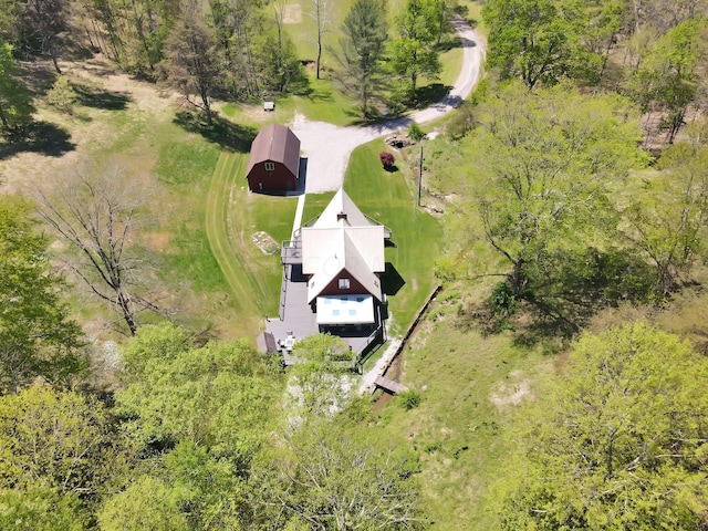 birds eye view of property featuring a rural view