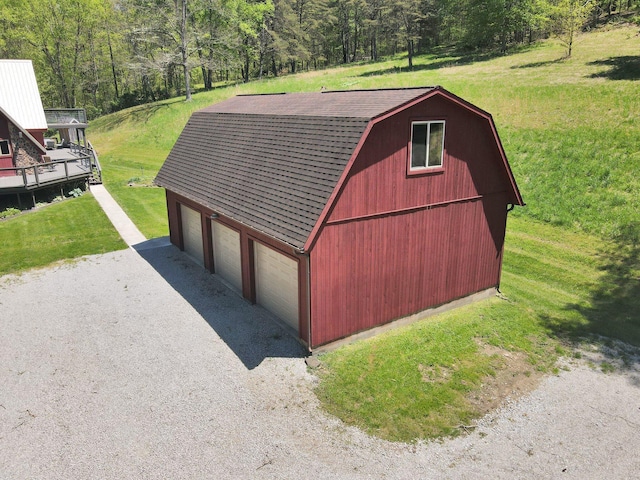 view of outdoor structure with a yard