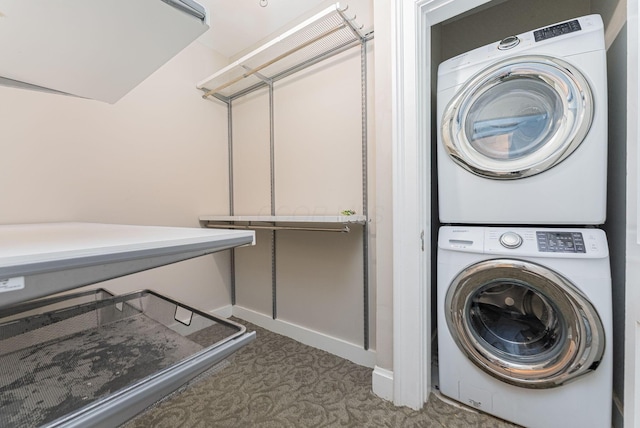 washroom with stacked washer and dryer