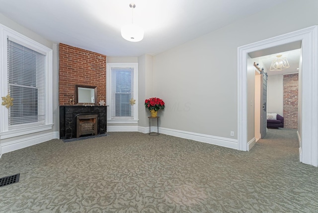 unfurnished living room with carpet floors