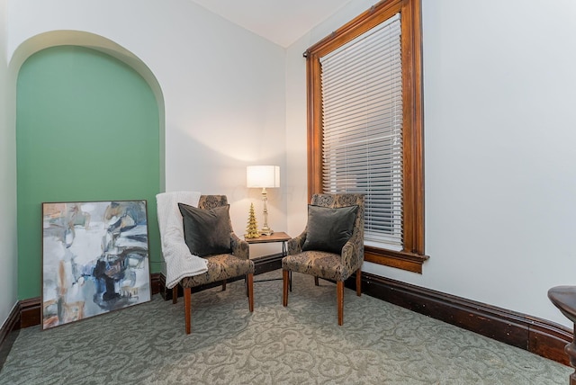 living area featuring light colored carpet