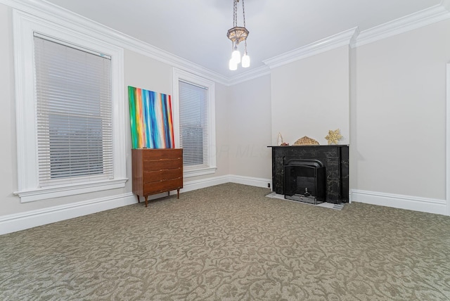 living room with ornamental molding and a premium fireplace