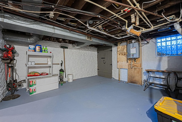 basement featuring water heater