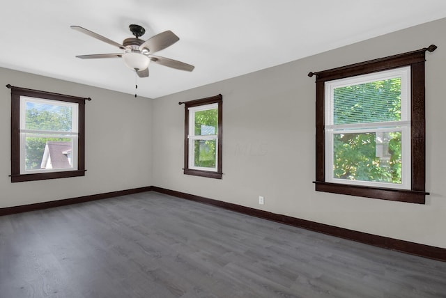 unfurnished room with ceiling fan and wood-type flooring