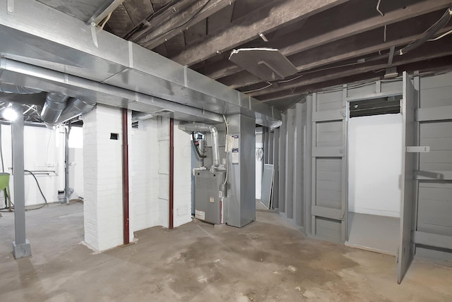 basement featuring heating unit