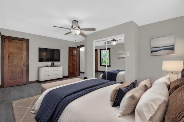 bedroom featuring a closet, dark hardwood / wood-style floors, and ceiling fan