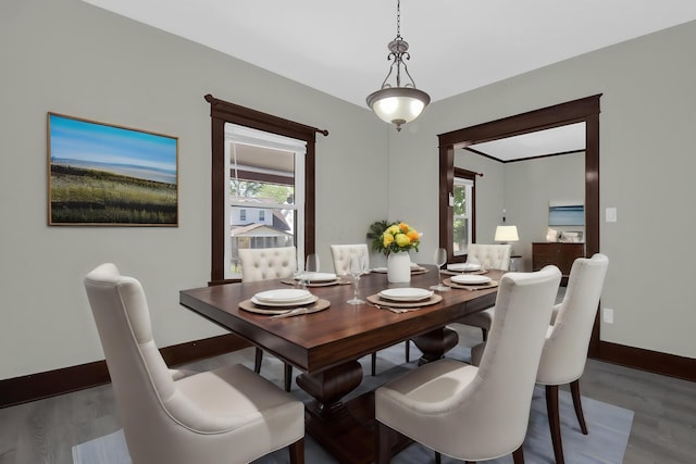 dining space with a healthy amount of sunlight and light wood-type flooring