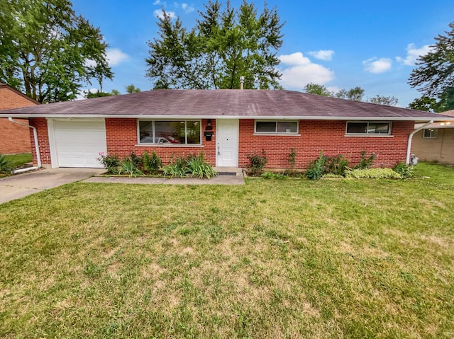 single story home featuring a front yard and a garage