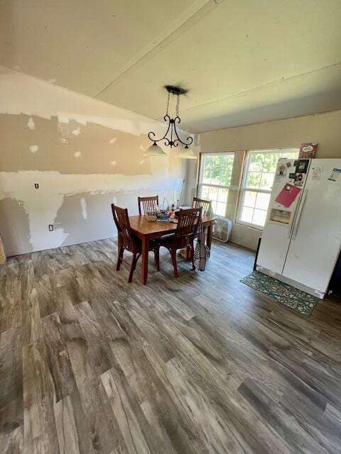 dining area featuring hardwood / wood-style flooring