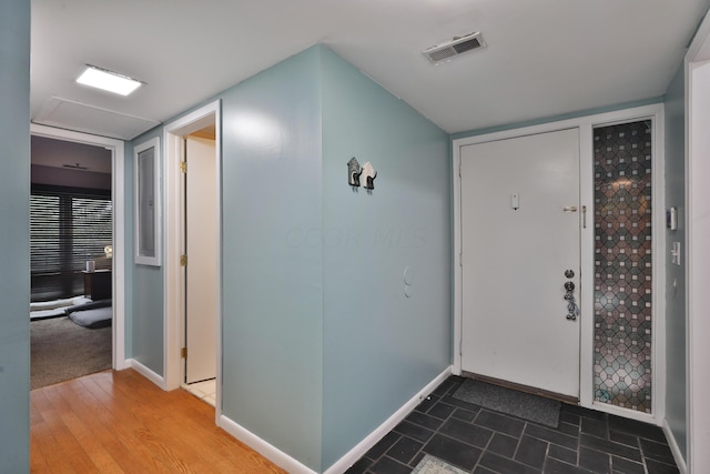 foyer featuring hardwood / wood-style flooring