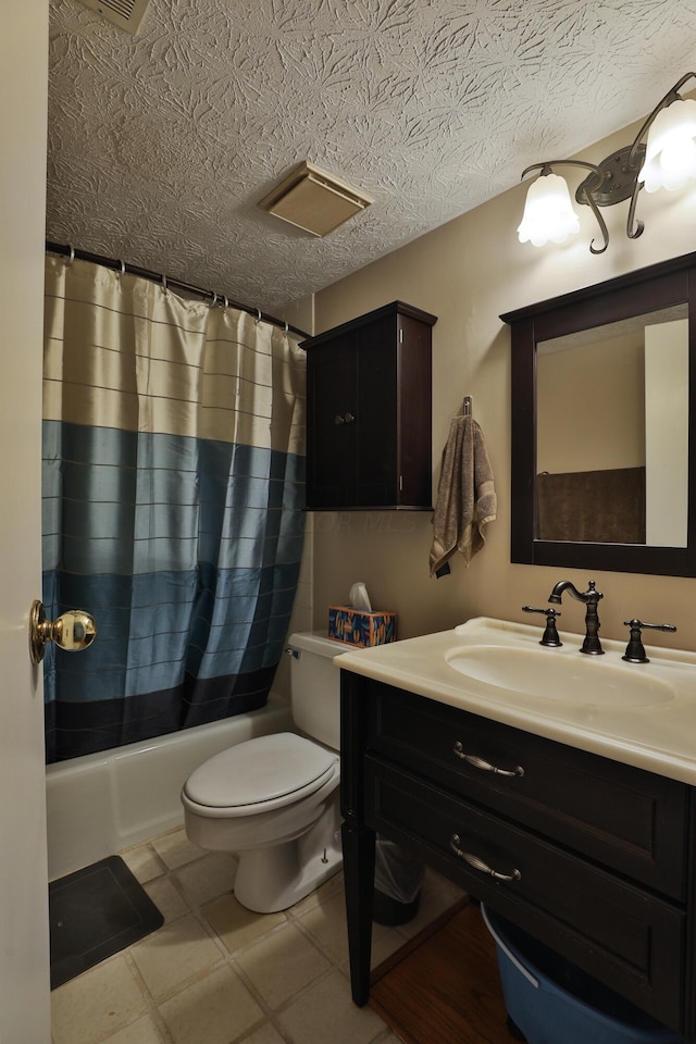 full bathroom featuring shower / bathtub combination with curtain, tile patterned floors, a textured ceiling, toilet, and vanity