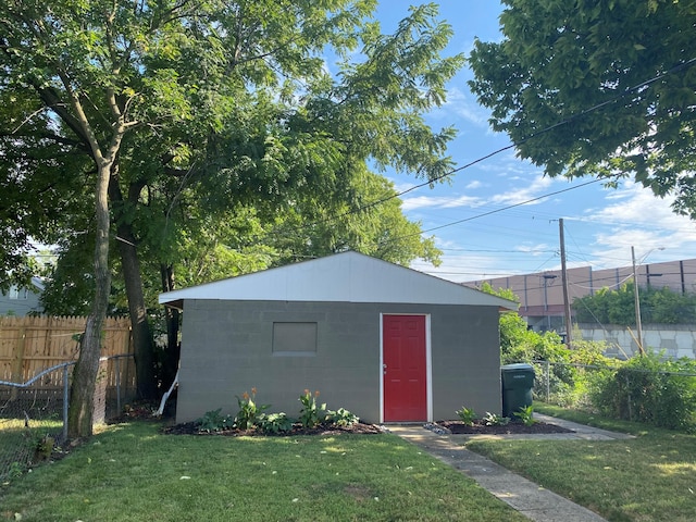 view of outdoor structure featuring a yard