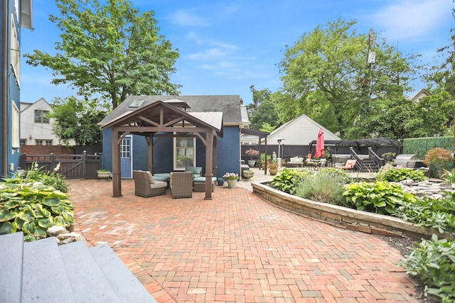 view of patio / terrace featuring a gazebo and an outdoor living space