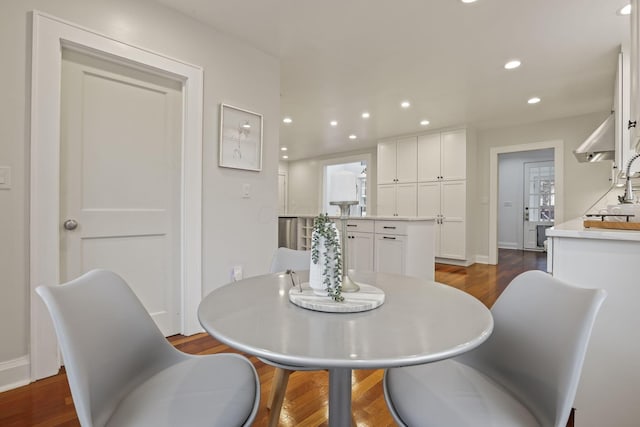 dining room featuring dark hardwood / wood-style floors