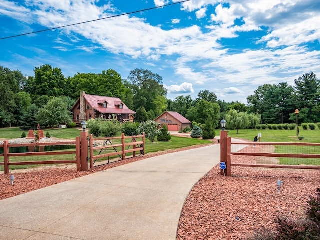 view of community with a yard