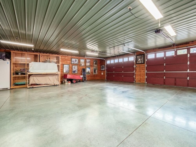 garage with white refrigerator