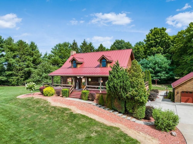 view of front of home with covered porch and a front lawn