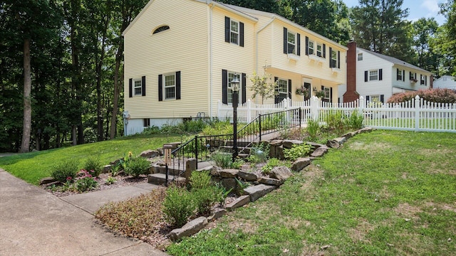 exterior space featuring a front lawn