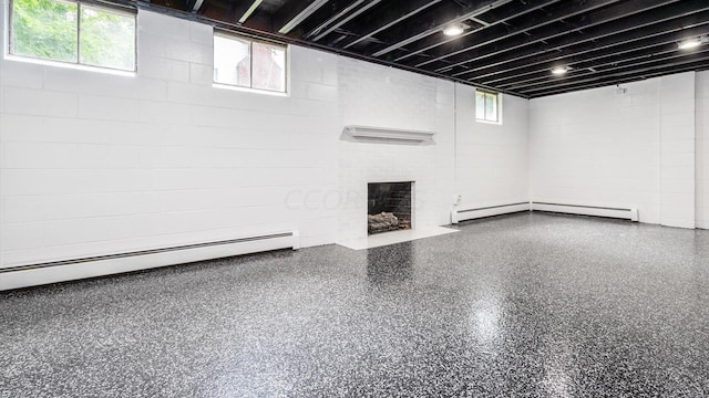 basement featuring a baseboard radiator