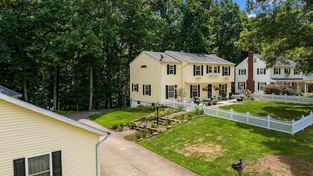 view of front of home with a front lawn