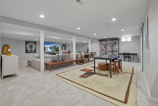 recreation room with light colored carpet