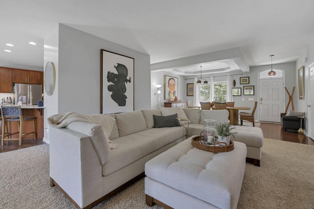 living room featuring dark wood-type flooring