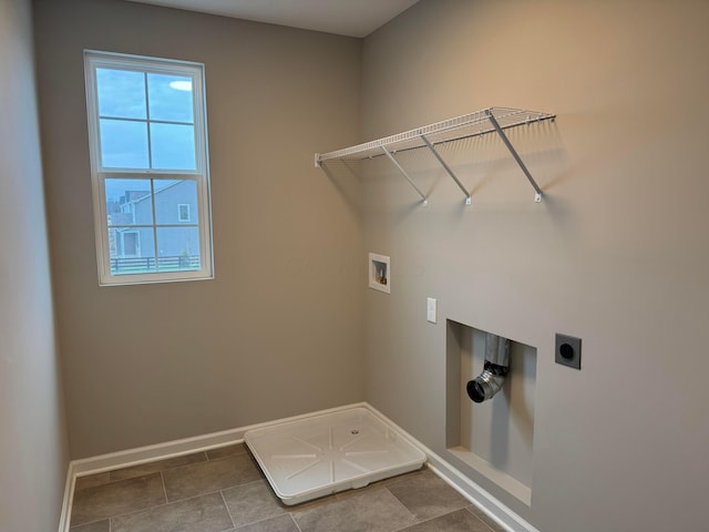 laundry room with hookup for an electric dryer, washer hookup, and tile patterned floors