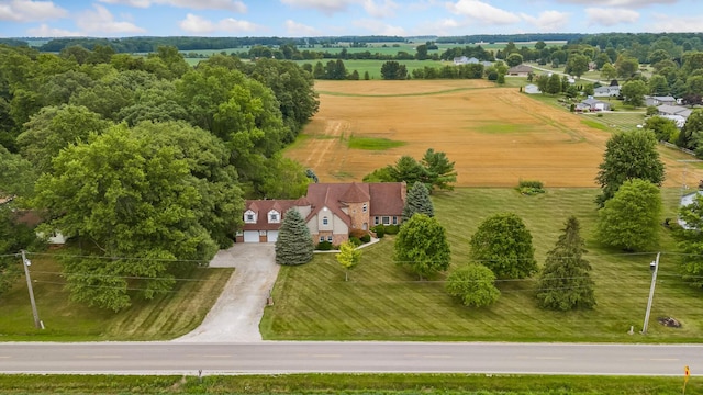 birds eye view of property featuring a rural view