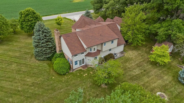 birds eye view of property featuring a rural view