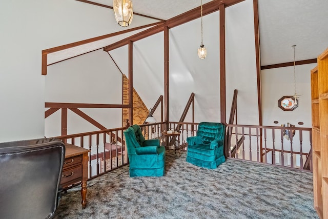 living area with high vaulted ceiling, a textured ceiling, and dark colored carpet