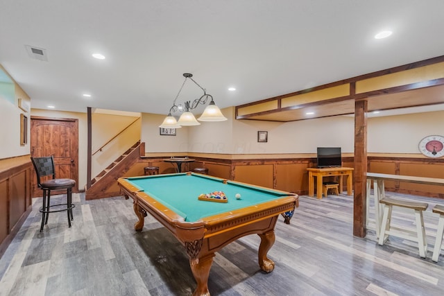 playroom with light hardwood / wood-style floors and pool table