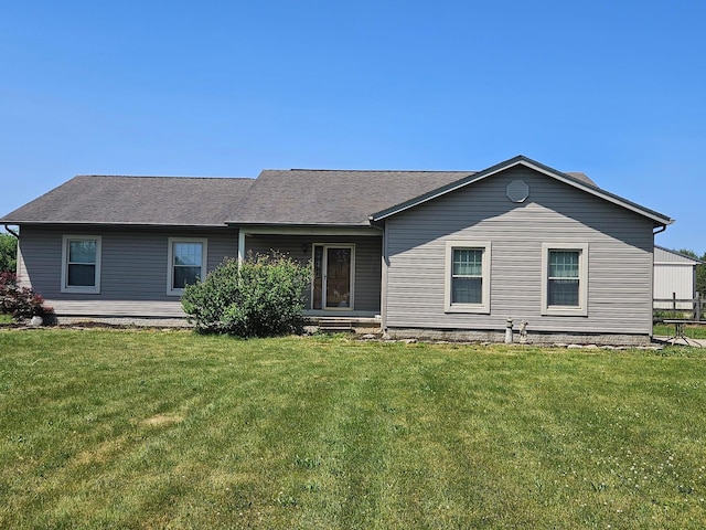 view of front facade featuring a front yard