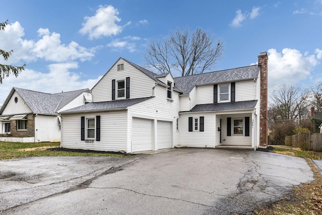 front of property with a garage