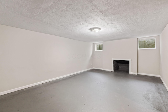 basement with a textured ceiling