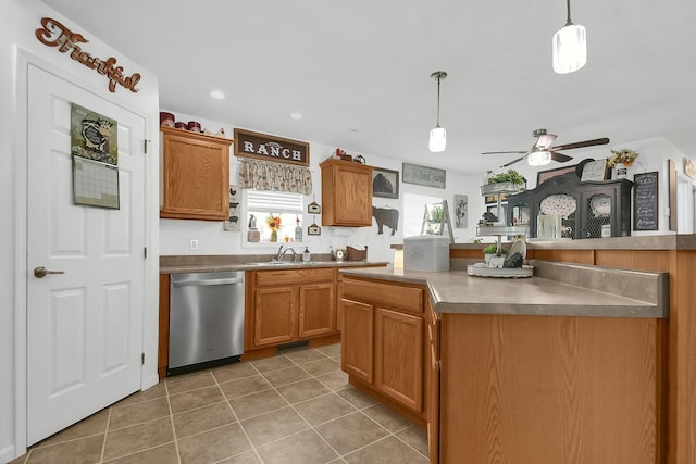 kitchen featuring tile patterned floors, ceiling fan, sink, decorative light fixtures, and dishwasher