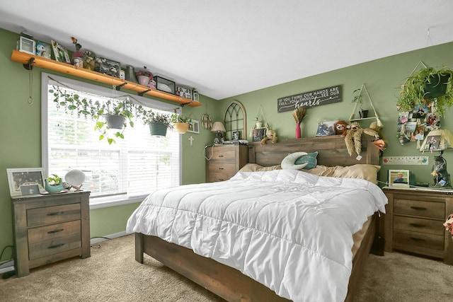 bedroom featuring light carpet