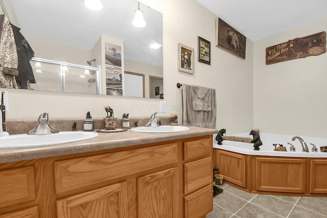 bathroom with tile patterned flooring, vanity, and independent shower and bath