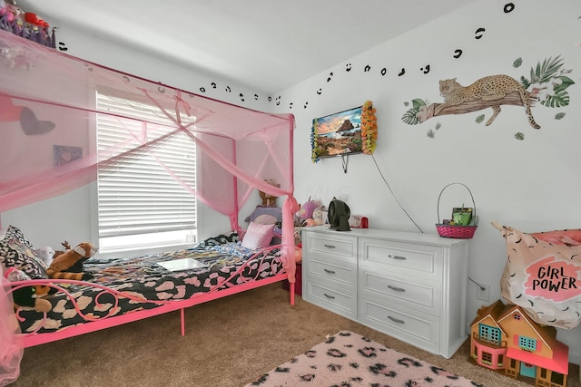 bedroom with carpet flooring and multiple windows