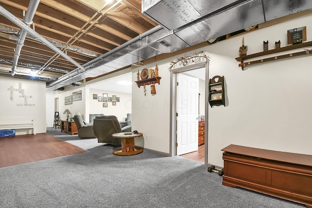 basement featuring carpet floors