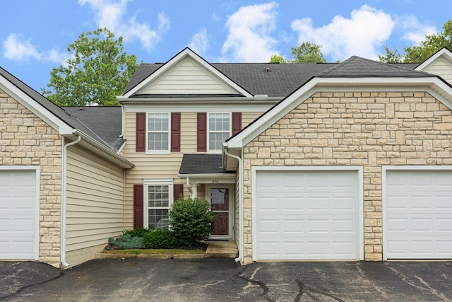 front of property featuring a garage