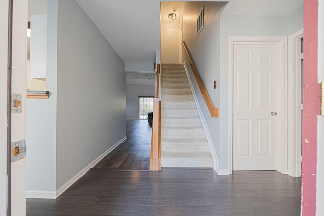 stairway with wood-type flooring