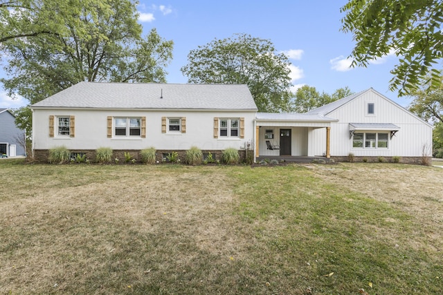 view of front of home with a front yard