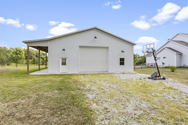 garage with a yard