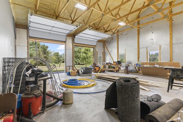 interior space featuring a workshop area and a healthy amount of sunlight